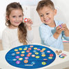 In Shapy the players throw three symbol dice. According to the combination of shapes shown on the dice, they need to quickly find the corresponding tile.