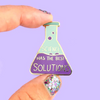 Jubly Umph - Science Has The Best Solutions Lapel Pin is a great conversation starter and a way to connect with others who share your passion for science.