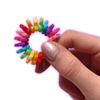 Dinky Things Fidgets - Petal Pop is an eye-catching fidget toy adorned with a kaleidoscope of rainbow petal shaped beads that are super satisfying to jiggle.