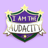 Have you ever been told you were too much when you were just… being you? Wear your Jubly-Umph - I Am The Audacity Lapel Pin and totally own it!