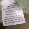 Each Little Joys Calming Kitty Weighted Toy has their special support message sewn into the side so you can read it everytime you give your weighted animal a hug.