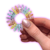 Dinky Things Fidgets - Shimmer Star Ring is a rainbow of colourful starry beads that make a satisfying sound as you fidget. The perfect pocket sized fidget!