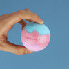 It's time to transform your bath time into a dazzling experience with our Glow Up Iridescent Bath Bomb. It's like taking a bath in a magical wonderland!