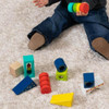 The Explore and Discover Sensory Blocks offer a diverse and multisensory learning experience by combining various shapes, textures, and sensory elements.