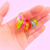 Dinky Things Fidgets - Tinkle Rings is a gorgeous fidget with textured round beads that make a sweet tinkling sound for fun sensory input.