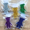 A handmade resin Spiky Bears – Glitter Worry Bear Fidget perfect for busy fingers, tactile exploration, worry moments and calming sensory play.