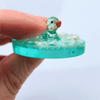 Handmade Sensory Stones - Bubble Bath Duck Fidget by Sensory Oasis for Kids. Cute resin fidgets with raised pearl-style bubbles for tactile sensory input.