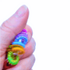 Dinky Things XL Fidgets - Clicky Ring is a bigger, chunkier version of our original Clicky Ring with colourful smooth and bumpy beads, gentle movement and a satisfying clicky sound.