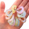 Dinky Things XL Fidgets - Tinkle Hearts is a bigger, chunkier version of our original Tinkle Hearts with smooth pearlescent heart beads, gentle sound and satisfying fidget movement.