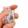 Dinky Things XL Fidgets - Twinkle Twist is a bigger, chunkier version of our original Twinkle Twist with pastel star-shaped beads, soft sparkle, gentle sound and satisfying fidget movement.