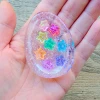 Handmade Sensory Stones - Rainbow Stars Worry Stone by Sensory Oasis for Kids. Smooth resin sensory stones with raised rainbow stars for tactile sensory input and pocket-sized calm.