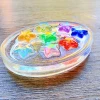 Handmade Sensory Stones - Rainbow Stars Worry Stone by Sensory Oasis for Kids. Smooth resin sensory stones with raised rainbow stars for tactile sensory input and pocket-sized calm.