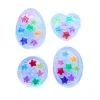 Handmade Sensory Stones - Rainbow Stars Worry Stone by Sensory Oasis for Kids. Smooth resin sensory stones with raised rainbow stars for tactile sensory input and pocket-sized calm.