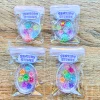 Handmade Sensory Stones - Rainbow Stars Worry Stone by Sensory Oasis for Kids. Smooth resin sensory stones with raised rainbow stars for tactile sensory input and pocket-sized calm.