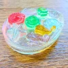 Handmade Sensory Stones - Sparkle Sea Worry Stone by Sensory Oasis for Kids. Smooth resin sensory stones with raised ocean-inspired details for tactile sensory input and pocket-sized calm.