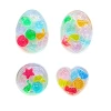 Handmade Sensory Stones - Sparkle Sea Worry Stone by Sensory Oasis for Kids. Smooth resin sensory stones with raised ocean-inspired details for tactile sensory input and pocket-sized calm.
