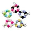 Meet the Dinky Things XL Fidgets - Fluffy Keychain, a soft tactile fidget with fluffy beads, colourful flower beads, a flexible wire centre and star keychain clip.