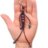Handmade in Australia, the Cosmic Metal Fidgets - Fidget Buddy features smooth metal beads, flexible cords and a keyring attachment for fidgeting fun on the go.