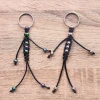 Handmade in Australia, the Cosmic Metal Fidgets - Fidget Buddy features smooth metal beads, flexible cords and a keyring attachment for fidgeting fun on the go.
