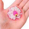 Handmade Sensory Stones - Bubble Bath Flamingo Fidget by Sensory Oasis for Kids, featuring raised pearl-style bubbles for satisfying tactile sensory input.