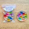 Handmade Sensory Stones - Rainbow Blocks Fidget by Sensory Oasis for Kids, featuring sparkly resin and colourful raised rainbow block details for tactile sensory fun.