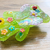 A handmade resin Spiky Bears – Butterfly Garden Worry Bear Fidget perfect for busy fingers, tactile exploration, worry moments and calming sensory play.