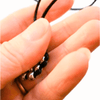 Cosmic Metal Fidgets - Cetus Necklace features smooth stainless steel beads and a breakaway safety clasp for discreet, calming sensory fidgeting.