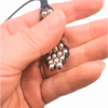 The Cosmic Metal Fidgets - Cetus Necklace Double is a wearable sensory necklace with smooth stainless steel beads and a flexible woven design for calming tactile input and everyday fidgeting.