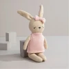 Meet Bella the Bunny, a soft 100% cotton knitted comfort toy with embroidered details, pink dress and bow. Perfect for cuddles, sensory play and gifting.