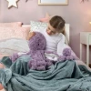 Mini & Me Weighted Plush - Octopus Oasis includes a 1.8 kg weighted octopus and mini companion, with soft plush, tactile tentacles and comforting sensory weight.