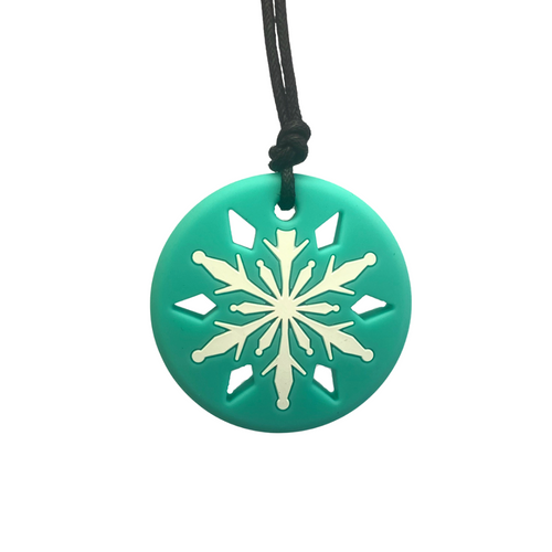 Jellystone Snowflake Pendant - White chewy necklace is stylish, sensory and perfect for kids who love to chew! Chew pendant is 100% food grade silicone.