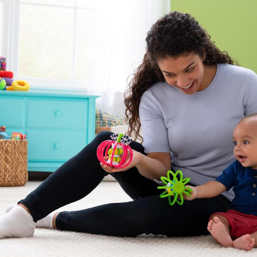 Lamaze Grab Apple is an engaging and multi-sensory toy designed to captivate your baby's attention and support their early development.