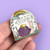 Jubly-Umph - Let's Go On An Adventure Lapel Pin inspires you to dust off your boots and get out into our beautiful world!