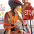 This bright Safety Vest Orange with reflective stripes make young drivers more visible.
