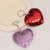 Add a touch of sparkle and affection to your everyday accessories with this enchanting Sequin Heart Keychain! The perfect little take anywhere fidget!