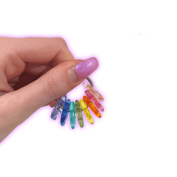Dinky Things Fidgets - Bloom Buddy has either transparent rainbow or colourful opaque flower shaped beads that make a lovely jingling sound as you fidget.