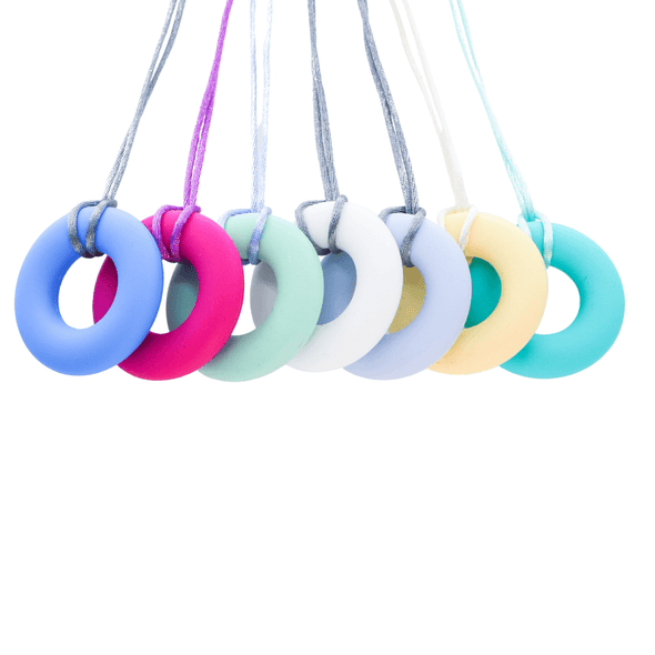 The Donut Pendant Adult Chew Necklace is more than just a sensory accessory; it's a statement piece that champions the seamless integration of functionality and style.