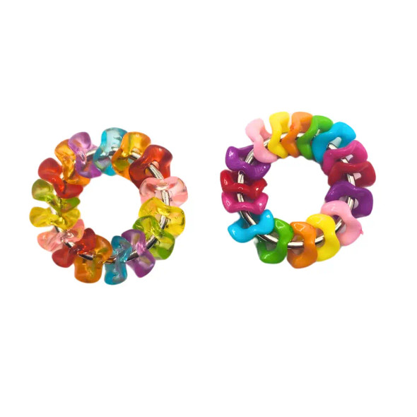 Dinky Things Fidgets - Wave is a fun fidget with cute little waved beads that are super satisfying to twist and twirl.