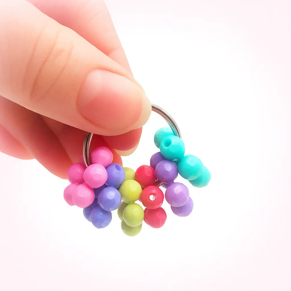 Dinky Things Fidgets - Bauble is a funky fidget with chunky textured round beads that make a great sound when fidgeting.