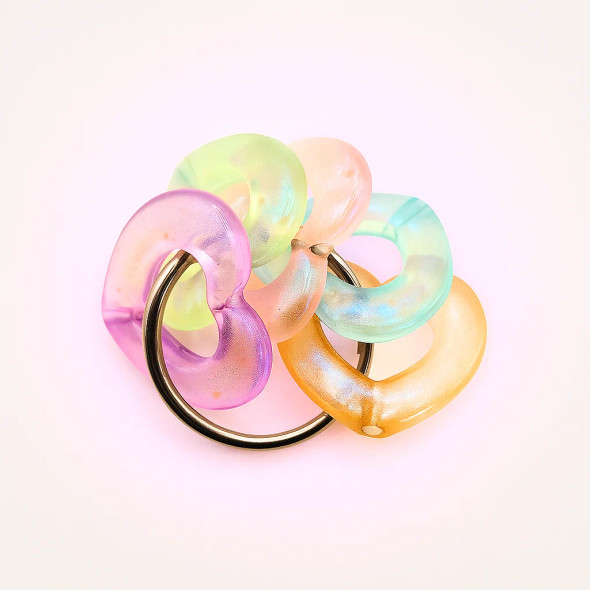 Dinky Things Fidgets - Tinkle Hearts is a gorgeous fidget with smooth pearlescent heart shaped beads that make a great sound for fun sensory input.