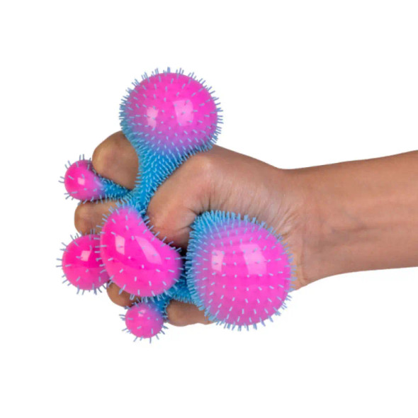 The Smoosho's Colour Change Furry Ball is the ultimate sensory fidget for busy hands and curious minds. Covered in soft stretchy “fur” spikes and packed with satisfying squishiness.