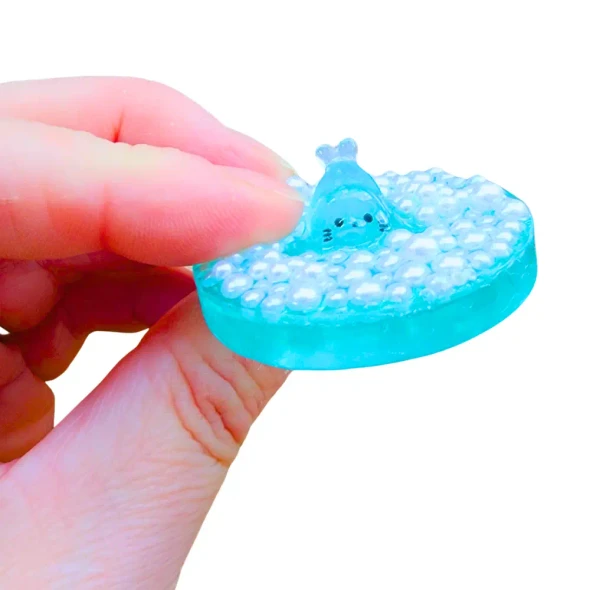 Handmade Sensory Stones - Bubble Bath Seal Pup Fidget from Sensory Oasis for Kids, featuring raised pearl-style bubbles for satisfying tactile sensory input.