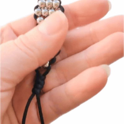 Handmade Cosmic Metal Fidgets - Cetus Double features a larger double design with polished stainless steel beads for calming tactile sensory input, focus and stress relief.