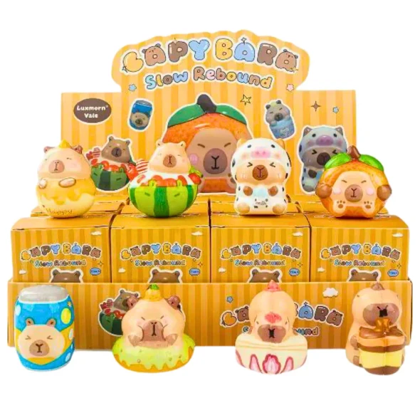 Collect the adorable Squishy Blind Box Capybara Family! Each mystery box contains one cute slow-rising capybara squishy that's perfect for sensory play, collecting and stress relief.