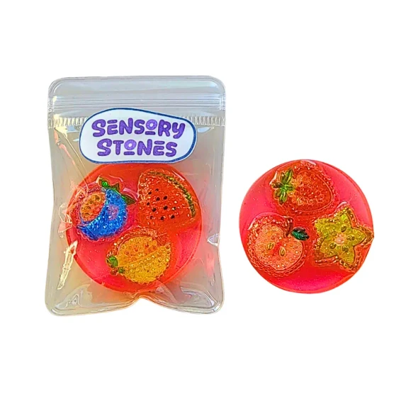 Handmade Sensory Stones - Fruit Tingle Fidget, featuring colourful raised fruit pieces in smooth resin for tactile fidgeting, sensory play and busy fingers.