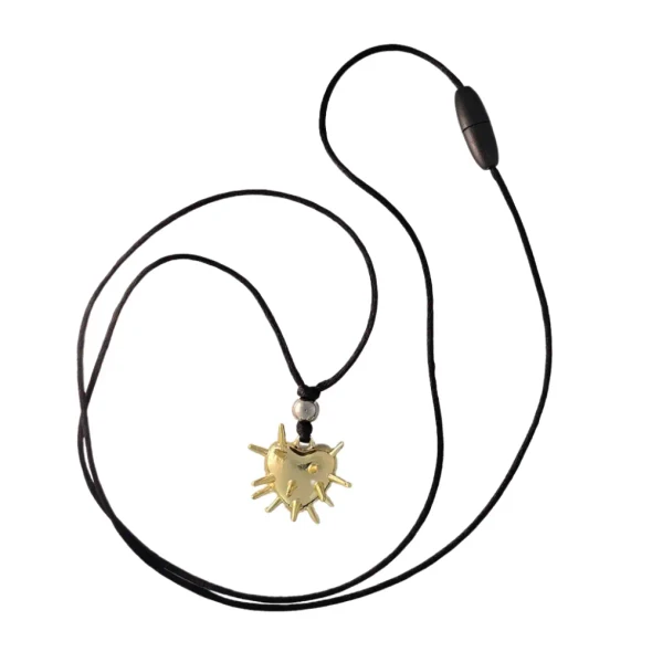 Handmade Cosmic Metal Fidgets - Heart Nebula Spiky Fidget Necklace with non-sharp spikes for strong tactile input and a smooth back for contrasting sensory feedback.
