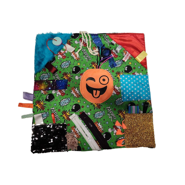 This gorgeous hand made Sensory Fidget Blanket E is full of fidgety fun! Each one is unique and has a variety of textures, tags, fabrics and activities.