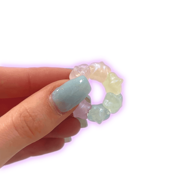 Dinky Things Fidgets - Nova Ring is a gorgeous little fidget with either pearlescent opaque or colourful transparent beads in the shape of cute little stars.