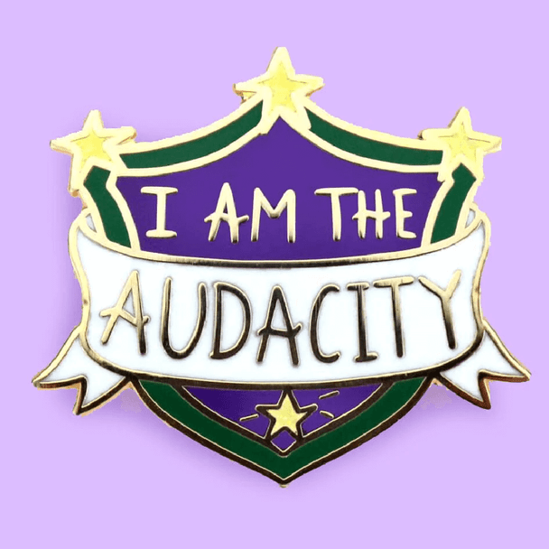 Have you ever been told you were too much when you were just… being you? Wear your Jubly-Umph - I Am The Audacity Lapel Pin and totally own it!