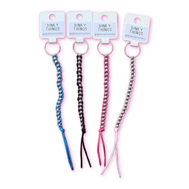 Dinky Things Fidgets - Metal Roller is a super star of the range consisting of smooth metal beads on a string that effortlessly glide along your fingers.